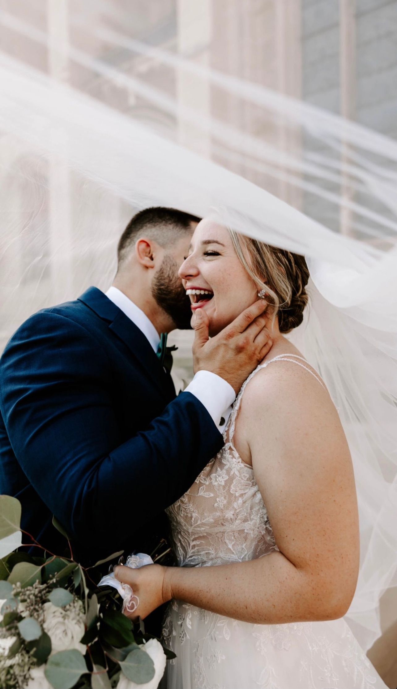 a bride and groom are kissing under a veil . natural wedding makeup. pittsburgh, pa. bridal makeup. bridal mua. wedding makeup artist. moriah e beauty. rachel wehan photography.