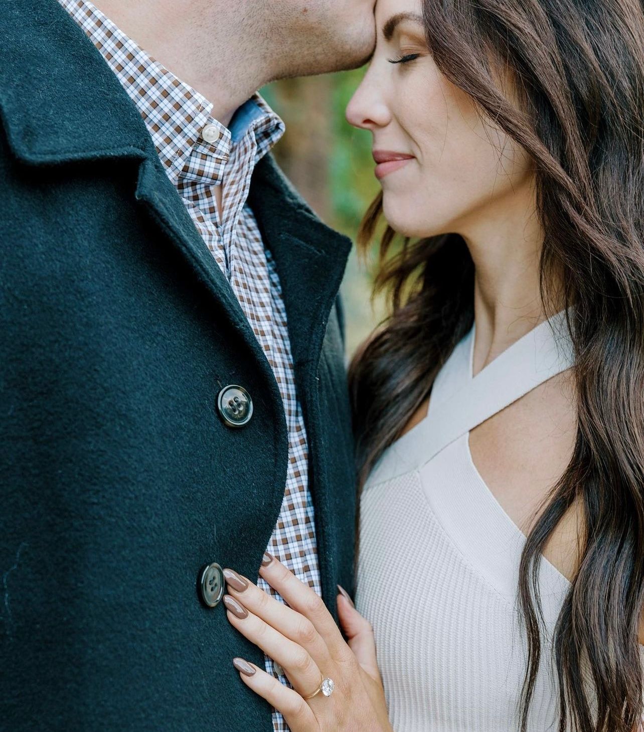 a man is kissing a woman on the forehead.  natural wedding makeup. pittsburgh, pa. bridal makeup. bridal mua. wedding makeup artist. moriah e beauty. lauren renee photography.