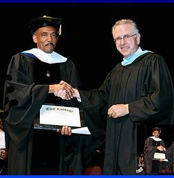 Roland Williams Receiving Diploma