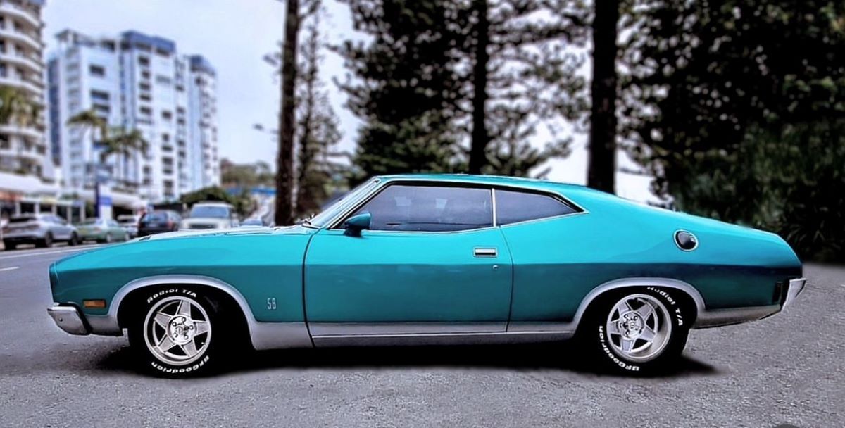 A Blue Car is Parked on the Side of the Road — VR Mechanical in West Gosford, NSW