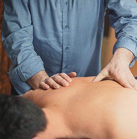 Treating Patient's Back — State College, PA — Back To Life Physical Therapy
