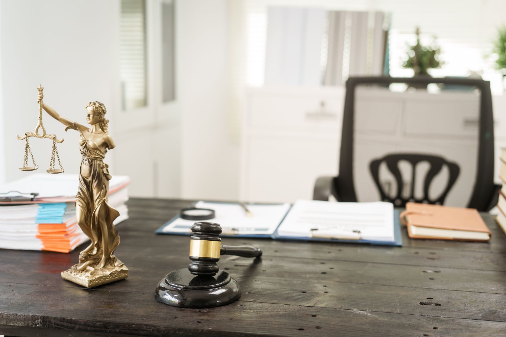 Two business professionals in suits reviewing documents, discussing strategy.