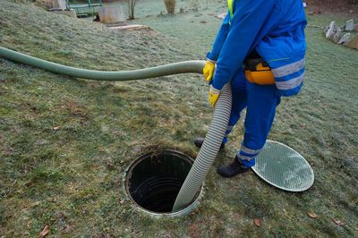 Septic Installation — Sewerage Worker In The Manhole in Lebanon, TN