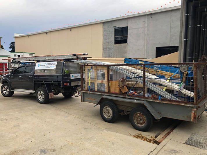 Delivery Vehicle Loaded with Air Conditioning Equipments — Electrician Near Me in NSW