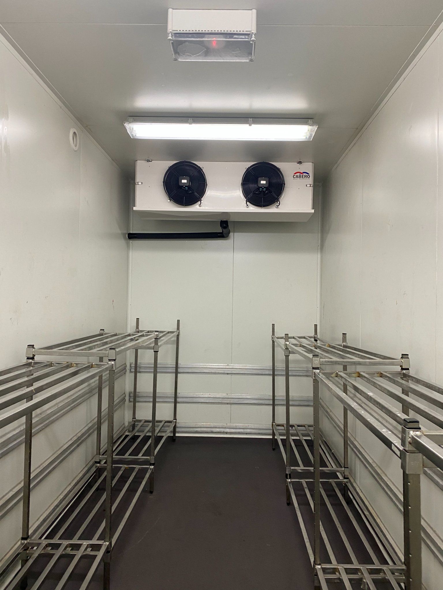 Control unit of a Cold room with huge pipes and electrical equipments — Refrigeration in Warwick