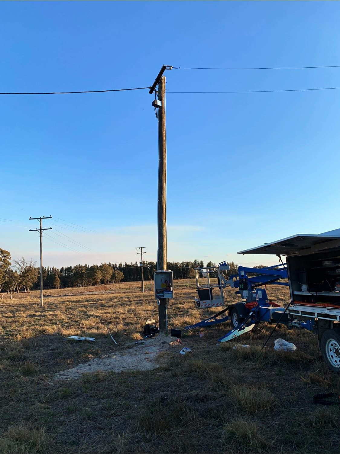 Electric Pole under the Blue Sky — Electrician in Tenterfield