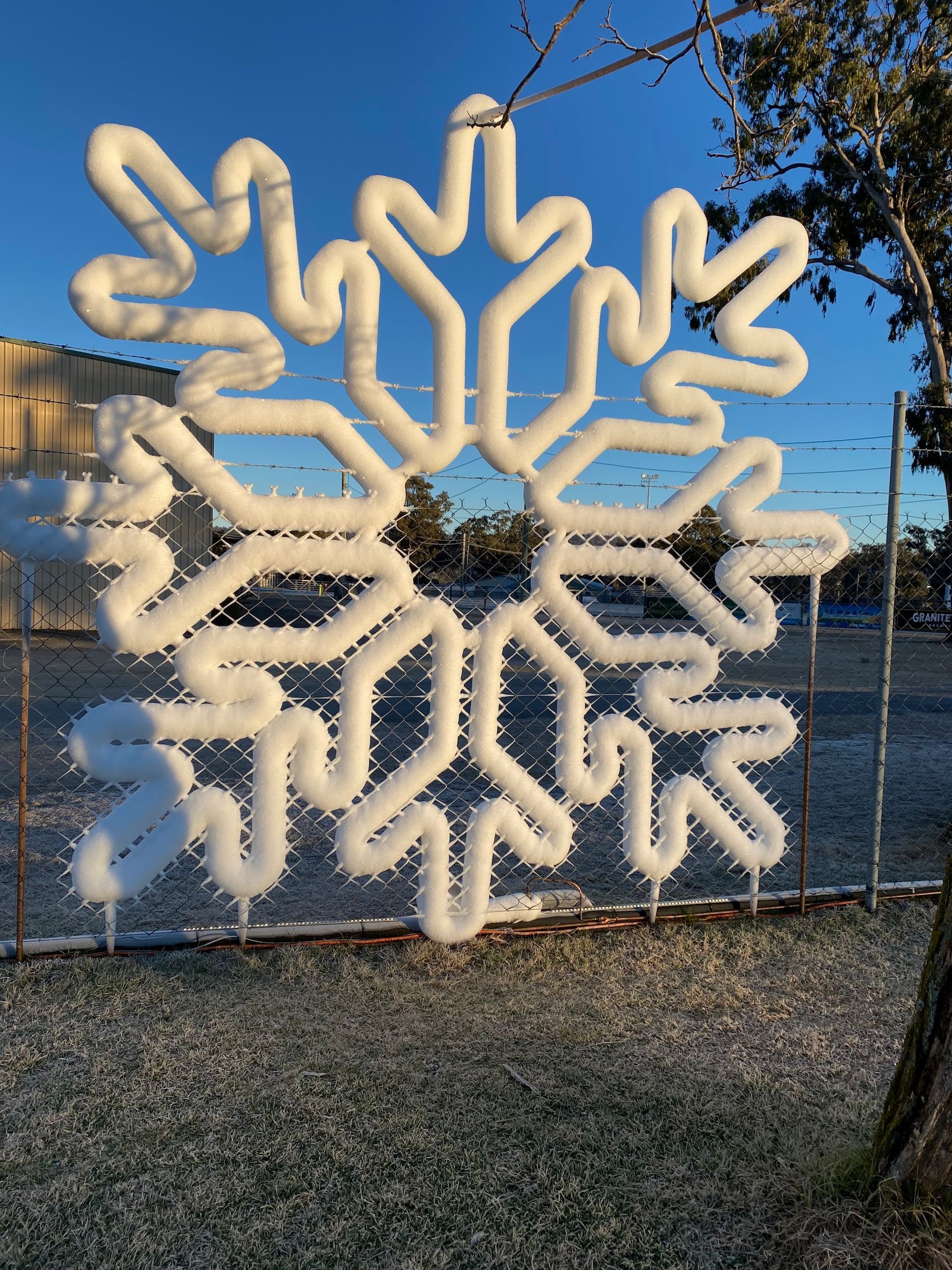 Electrified Snow Flake Lighting On Fence — Electrician in Stanthorpe