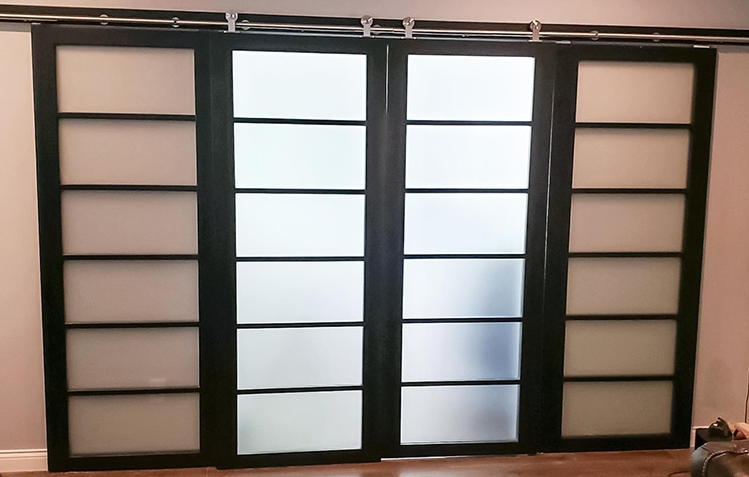 Custom sliding office double door with glass inset built in Fishers IN by Urbane Upgrade