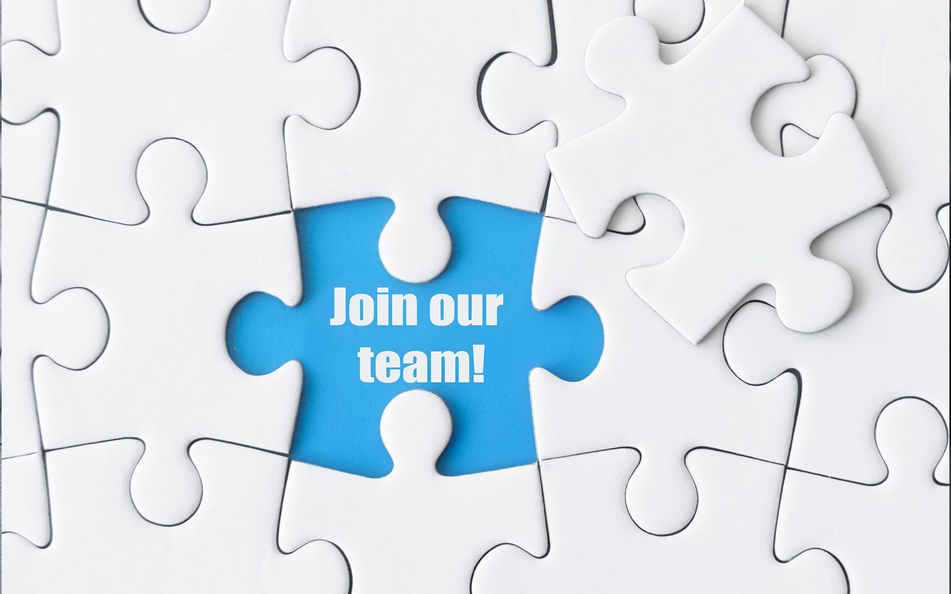 A puzzle with a blue piece that says join our team