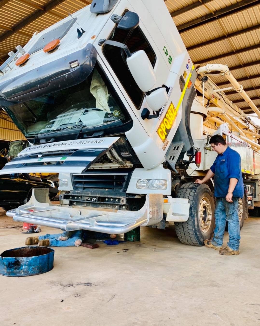 Team Operating On Truck — Traction Diesel Services in Clermont, QLD