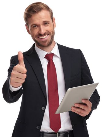 Insurance Agents — Smiling Man Holding Tablet in Ferdinand, IN