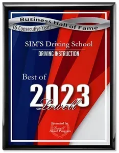A business hall of fame award for sim 's driving school