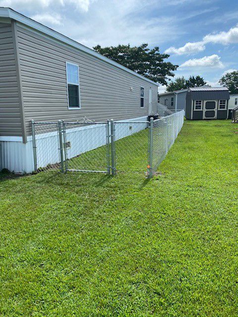 Chain Link Fence in the Backyard — Suffolk, VA — Action One Fence & Deck
