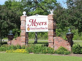 A sign for myers colonial funeral home inc.