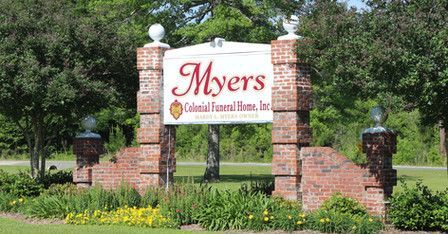 A sign for myers colonial funeral home inc.