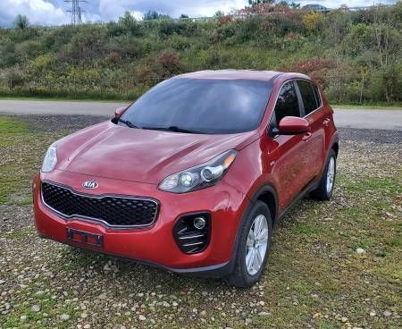 FRONT LEFT SIDE VIEW OF 2018 KIA SPORTAGE LX — FALCONER, NY — DEPENDABLE AUTO & TOWING