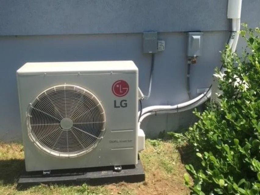 LG air conditioner unit outside a building.