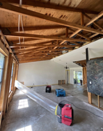 An aerial view of a large wave in the ocean.