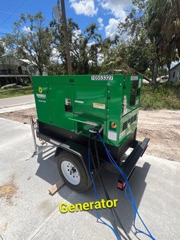 An aerial view of a large wave in the ocean.