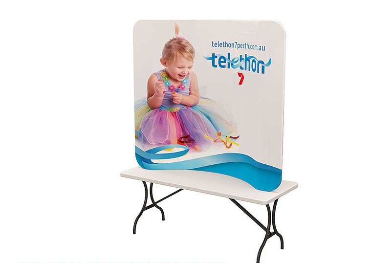 A folding table with a picture of a baby on it.