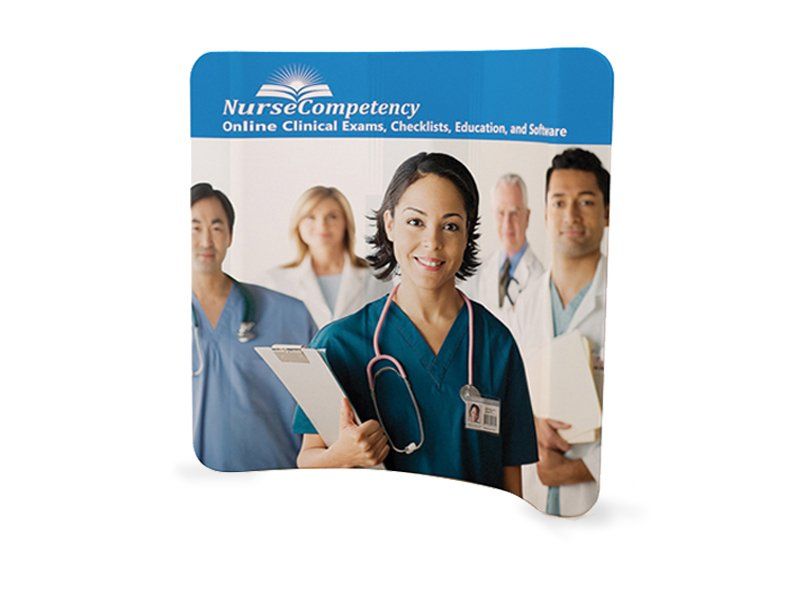 A group of doctors and nurses are standing next to each other.