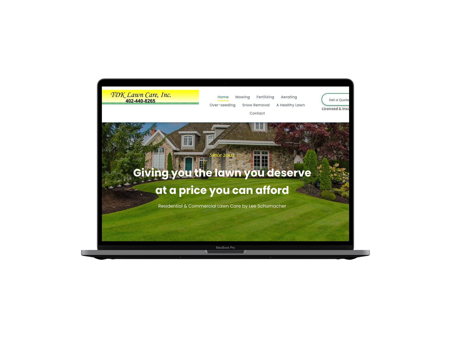 A laptop computer is open to a website that says `` giving you the lawn you deserve at a price you can afford ''.