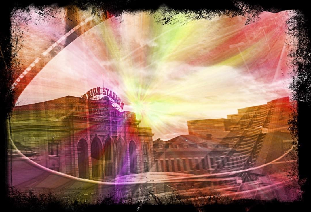 Blurred building exterior with colorful streaks and light flares, 