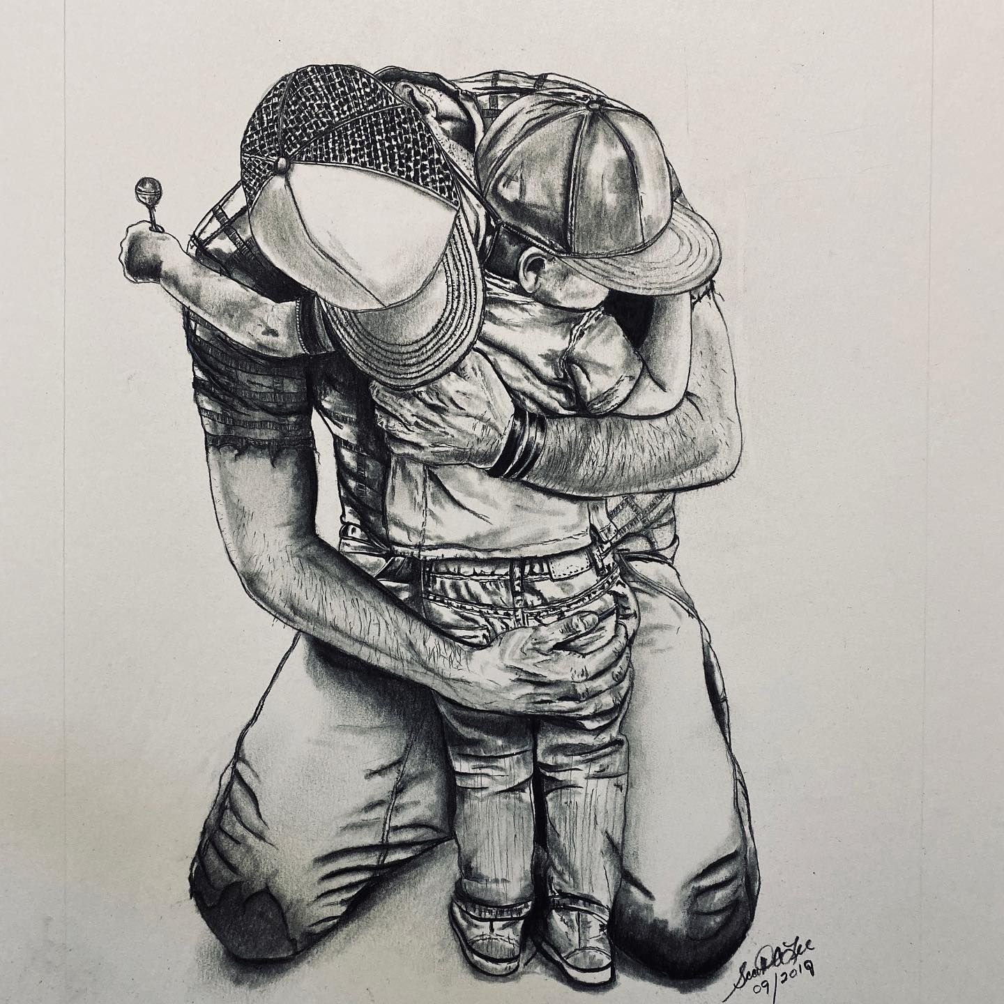 Man kneeling, hugging small child. Both wearing caps, child holding lollipop. Black and white sketch.