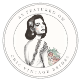 A black and white drawing of a woman in a wedding dress holding a bouquet of flowers.