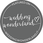 The logo for wedding wonderland is featured on wedding wonderland.