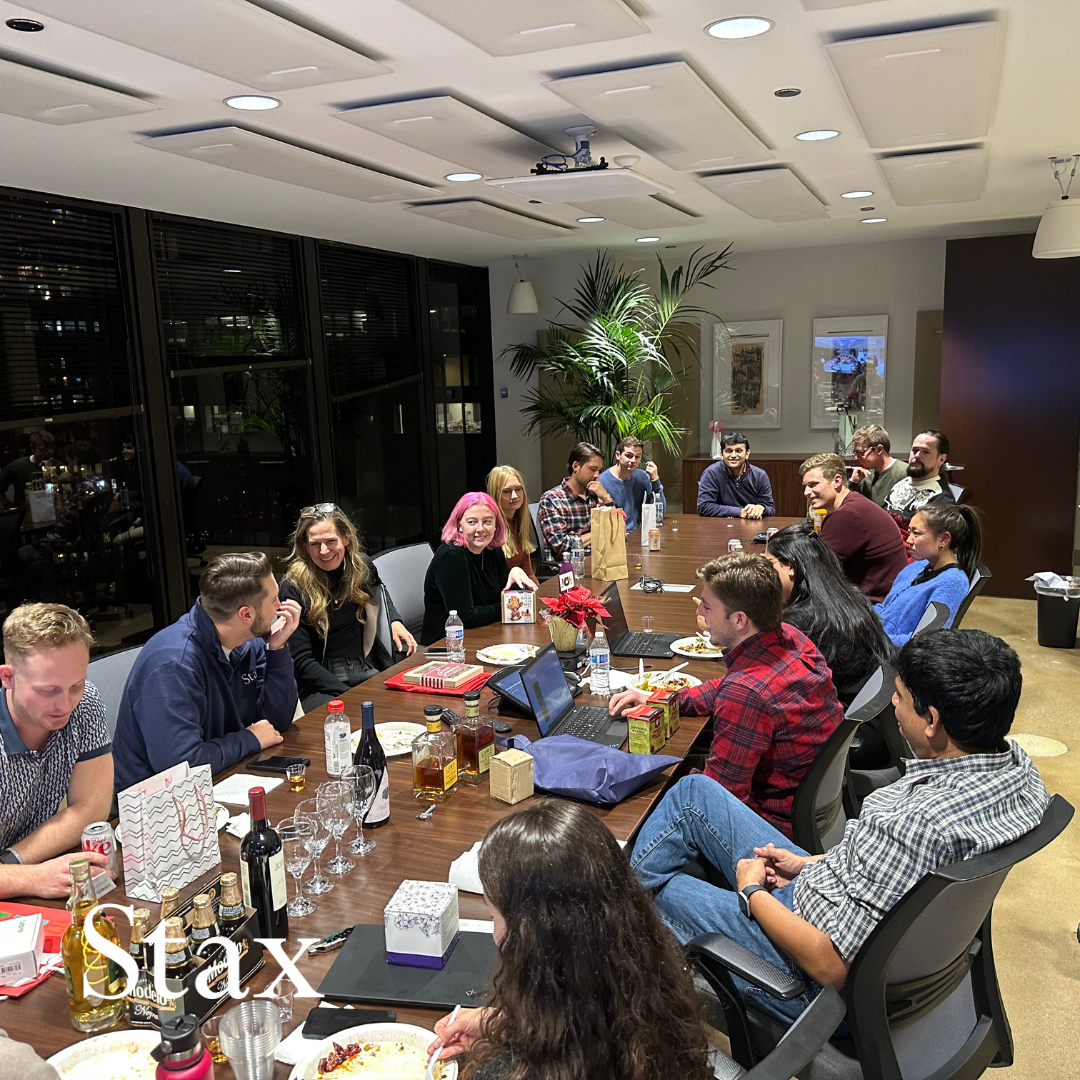 Colleagues in our Stax Chicago office gather for the annual White Elephant Gift Exchange