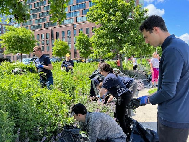 Fellow Stax New York Colleagues assisting in the clean up of Hunters Point Park.