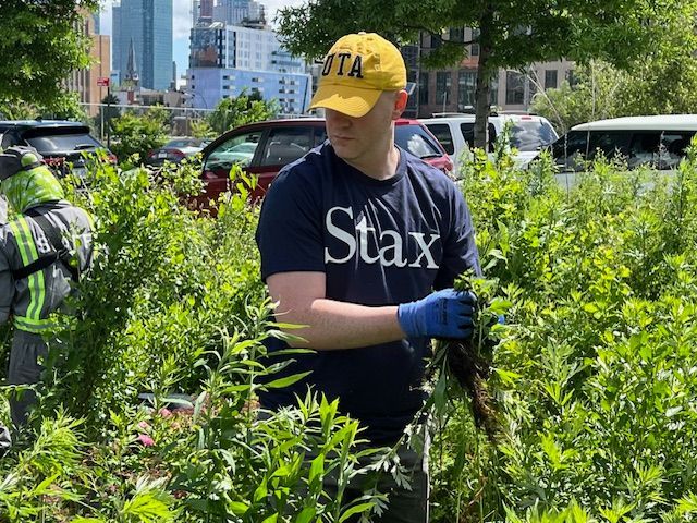 A New York Staxer at Hunters Point Park for a summer volunteering event.