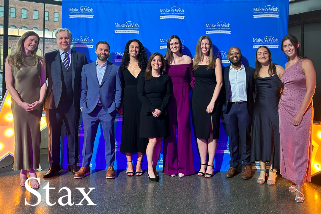 Colleagues from the Stax Boston office gather for a photo at the Make-a-Wish event
