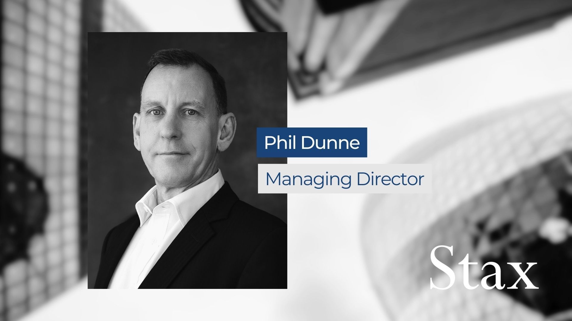 Image of Phil Dunne with text which states his name and title (managing director). Stax logo is in the lower right hand corner. 