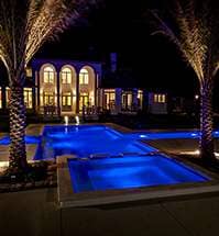 Pool Servicing — Modern House With Pool At Night Time in Reynoldsburg, OH