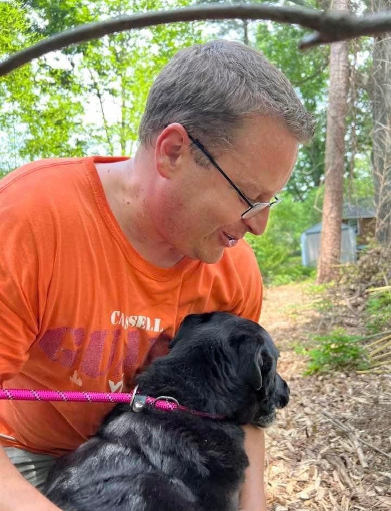 Woman Kissing A Dog — Stephens City, VA — Professional Pet Trackers
