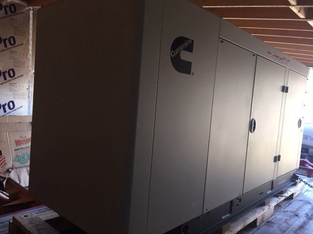 A large gray box with a cummins logo on it