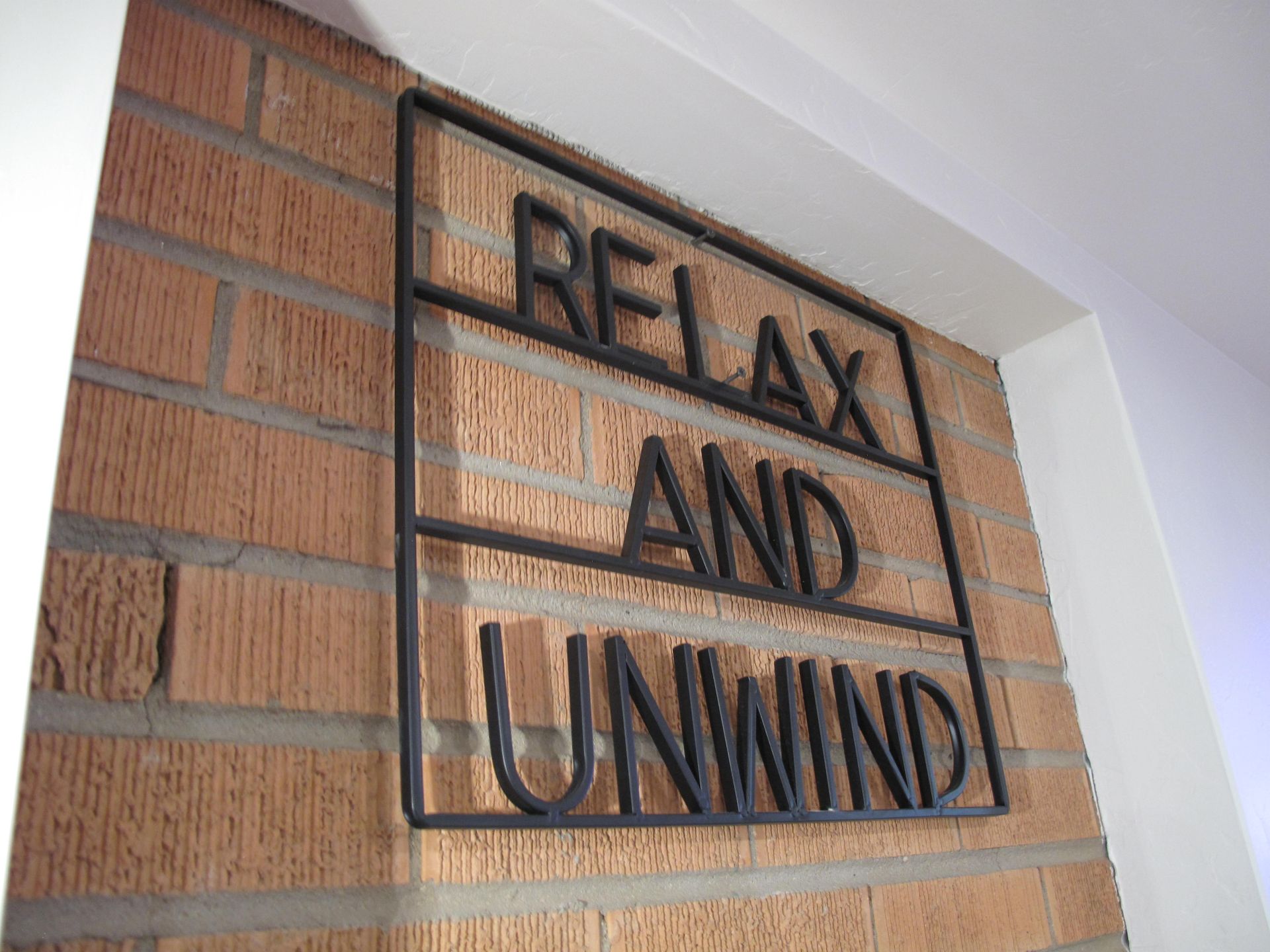 Relax and unwind sign