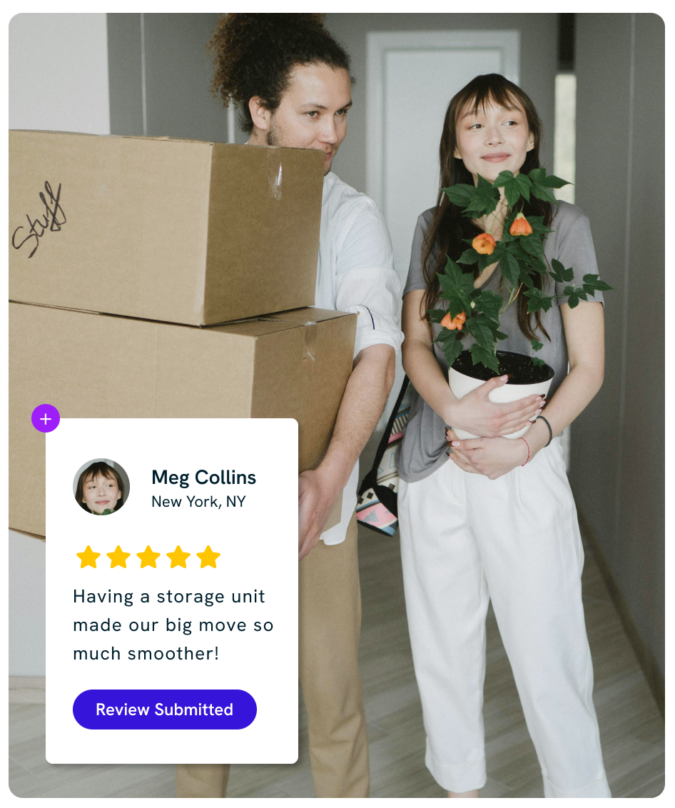 Couple carrying boxes and a plant; review for storage unit.
