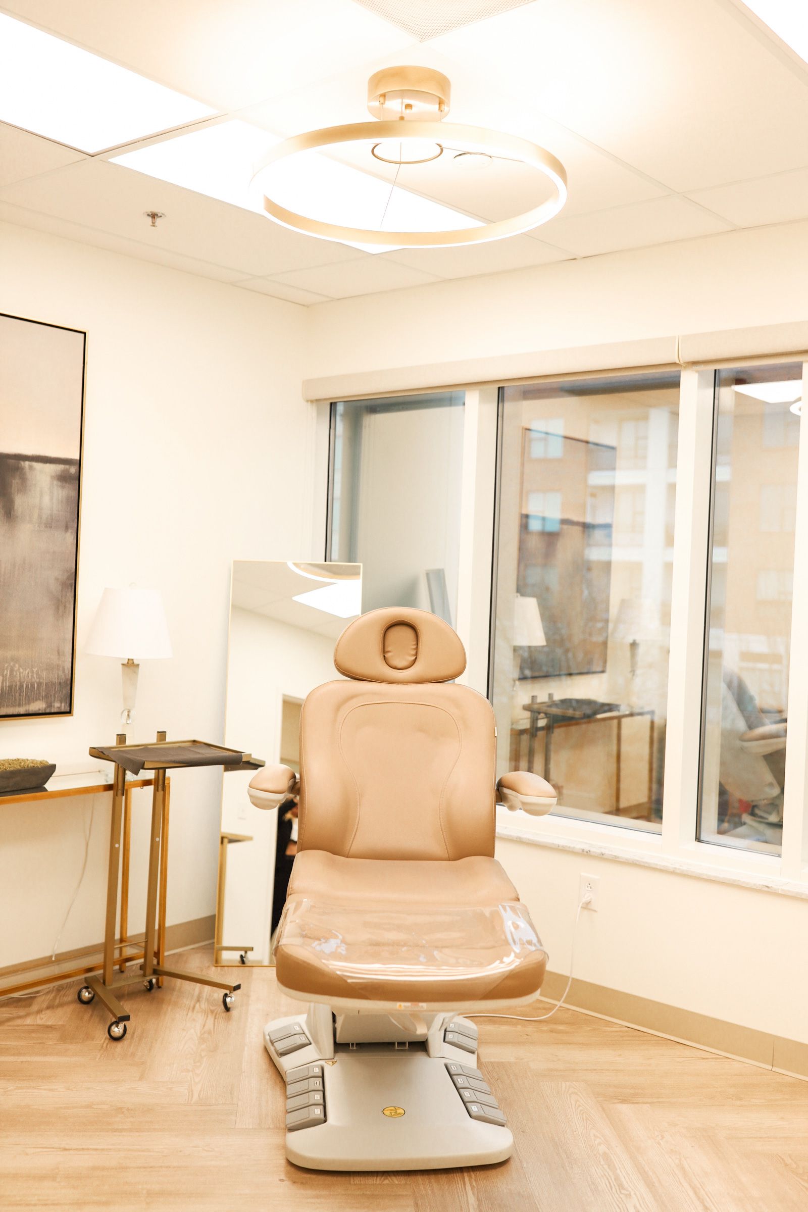 Clean, professional medical spa treatment room with neutral tones at Grace Aesthetics in Franklin
