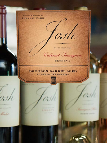 A can of leinenkugel 's beer with a lake in the background