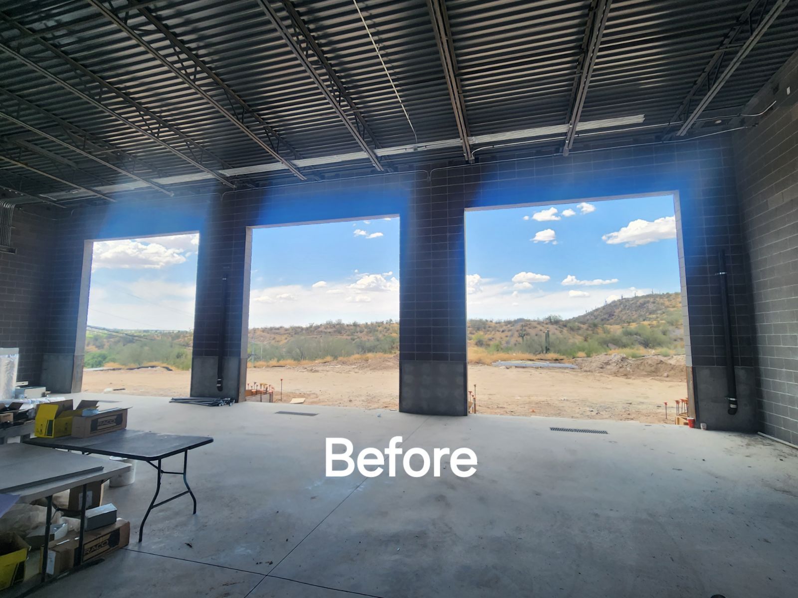 A before picture of a building with a lot of windows.