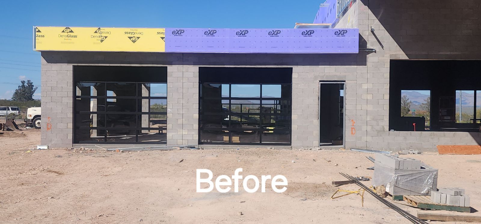 A picture of a building under construction with the words before below it.