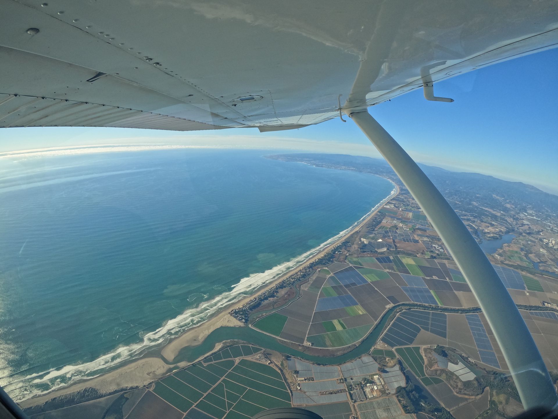 Scenic plane ride on the climb to skydive jump altitude at Skydive Santa Cruz. 