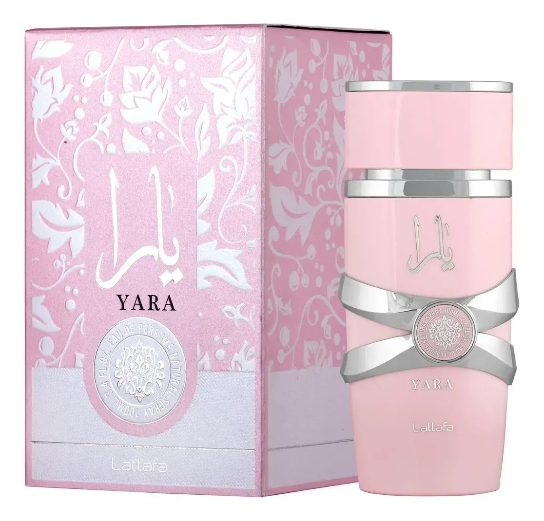 Frasco de perfume Pink Yara y caja a juego con detalles plateados y diseño floral.
