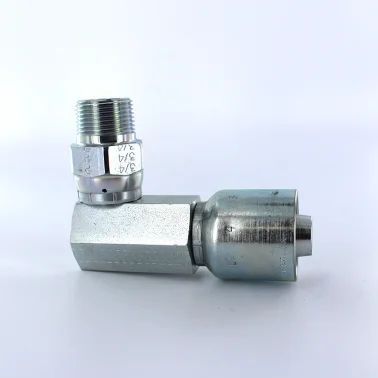 A close up of a hydraulic hose connector on a white surface.