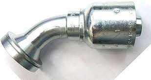 A close up of a hose fitting on a white surface.