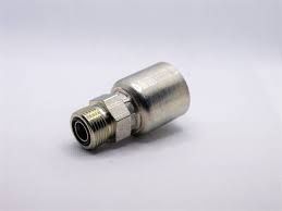 A close up of a hose connector on a white surface.