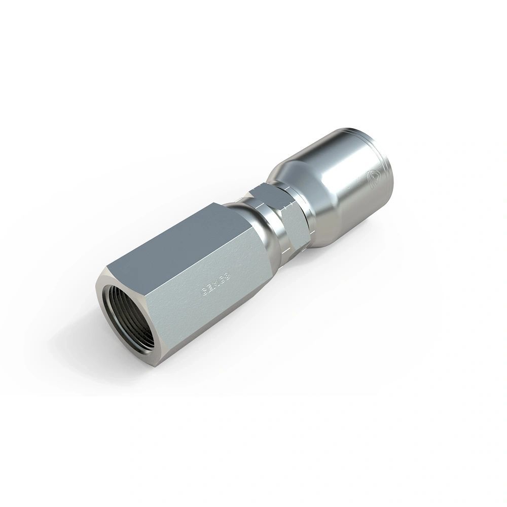 A close up of a stainless steel hose connector on a white background.